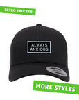 "Always Anxious" in white block text embroidered on black patch with white merrowed edge on a curved brim snap back.  Art by Print Ritual.