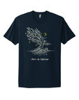 Image of wind blown tree bent with exposed roots, lines are present to indicate wind, a small gravestone is to the side and “Behold the Nightmare” is below in white ink. Yellow leaves and a yellow crescent moon are also present. On navy blue shirt.